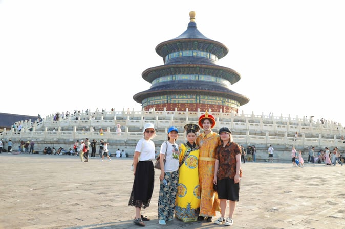 Participants in the Columbia University Symposium Club at ISB pose in front of the Temple of Heaven